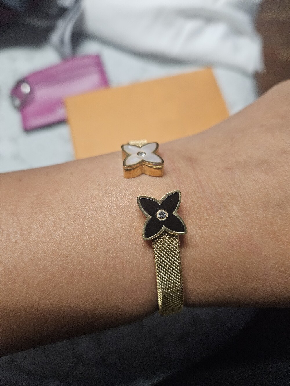 Gold Mesh Bracelet with Black and White Flower Charms